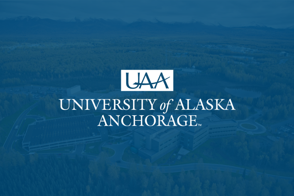 University of Alaska at Anchorage white logo with blue overlay of campus photography